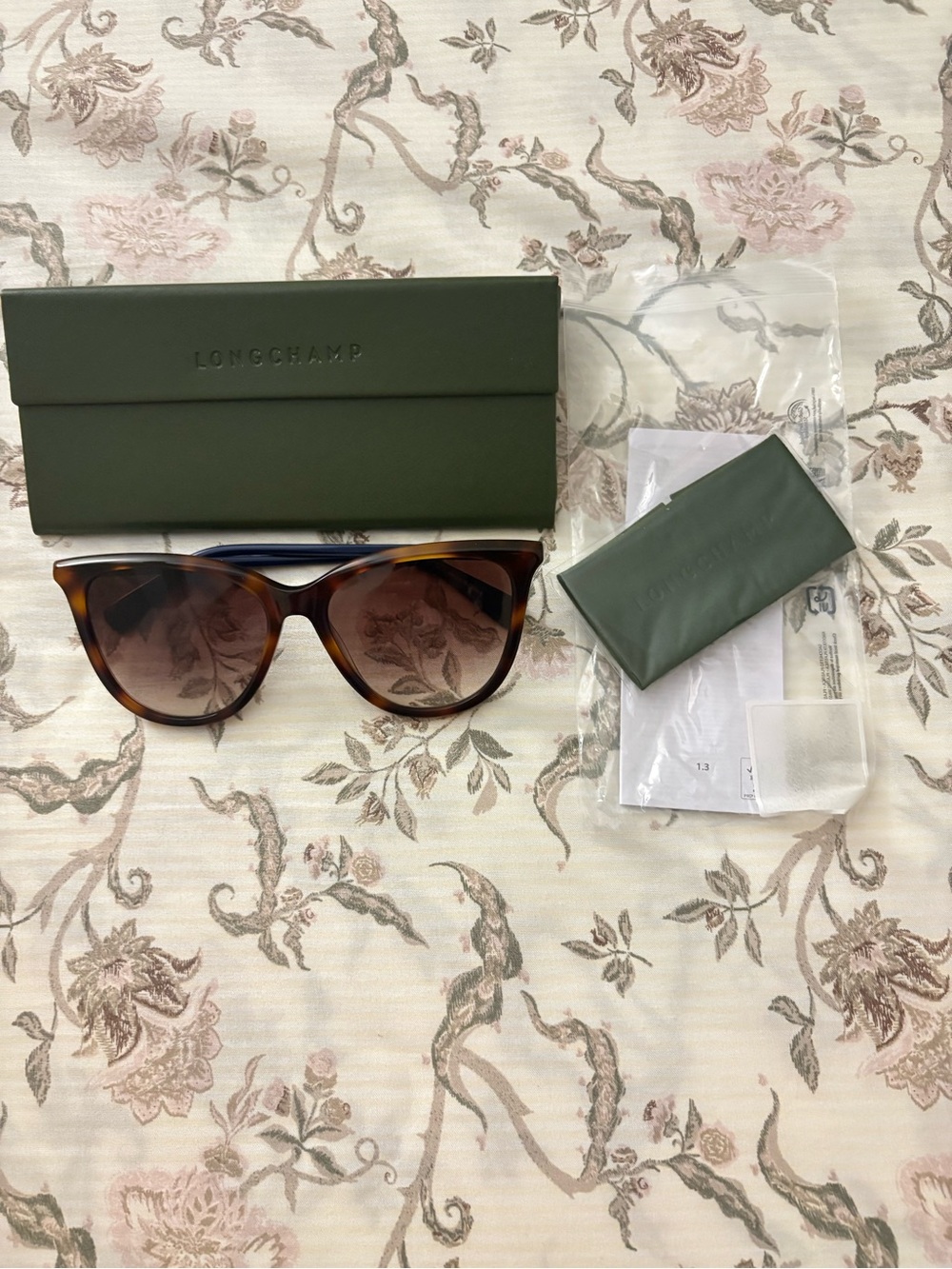 Longchamp Brown Tortoiseshell Cat-Eye Sunglasses with blue accent